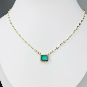 Elegant 18K Gold Necklace with Caribbean Blue Gemstone